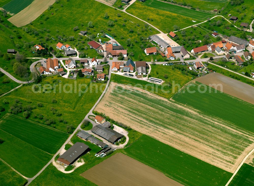 Aerial image Amstetten - Agricultural land and field boundaries surround the settlement area of the village in Amstetten in the state Baden-Wuerttemberg, Germany