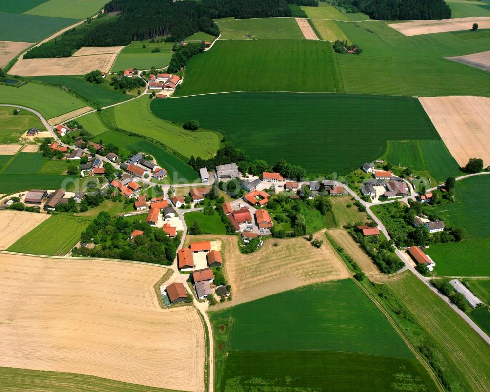 Aerial image Angerbach - Agricultural land and field boundaries surround the settlement area of the village in Angerbach in the state Bavaria, Germany