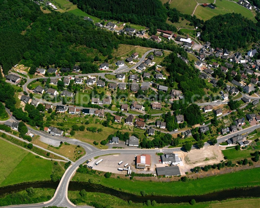 Arfeld from the bird's eye view: Agricultural land and field boundaries surround the settlement area of the village in Arfeld in the state North Rhine-Westphalia, Germany