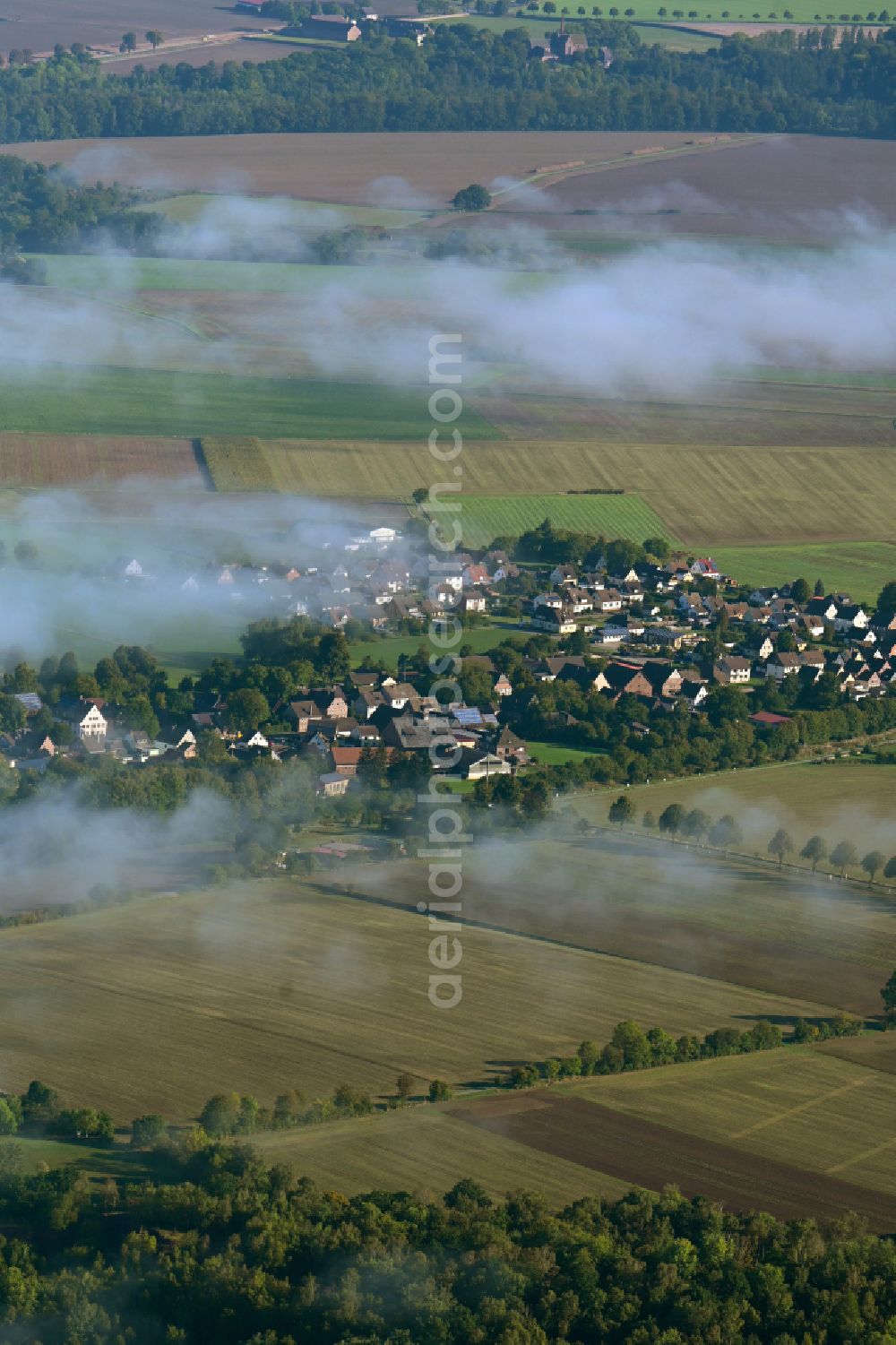 Aerial photograph Arholzen - Agricultural land and field boundaries surround the settlement area of the village on street Hauptstrasse in Arholzen in the state Lower Saxony, Germany