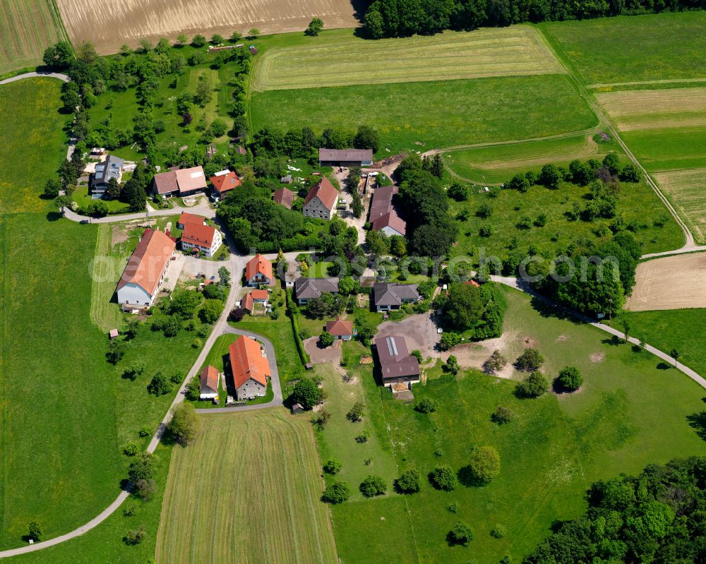 Attenweiler from the bird's eye view: Agricultural land and field boundaries surround the settlement area of the village in Attenweiler in the state Baden-Wuerttemberg, Germany