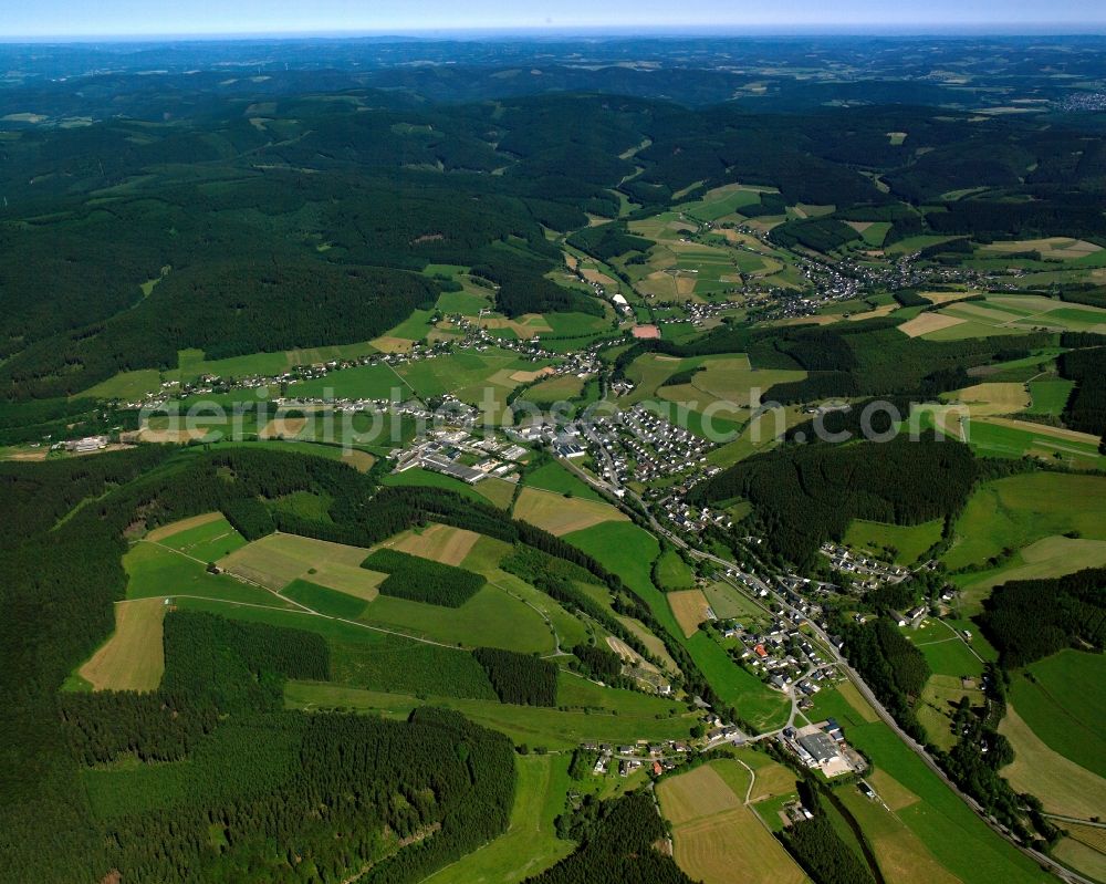 Aerial image Aue - Agricultural land and field boundaries surround the settlement area of the village in Aue in the state North Rhine-Westphalia, Germany