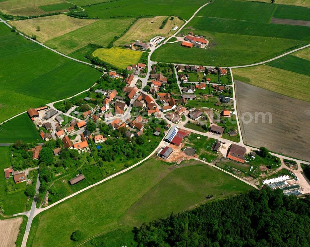 Aerial photograph Auerbach - Agricultural land and field boundaries surround the settlement area of the village in Auerbach in the state Bavaria, Germany