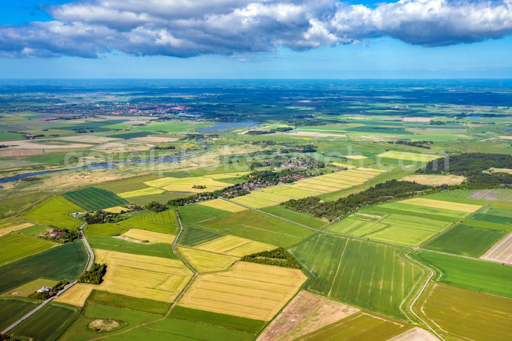 Aventoft from the bird's eye view: Agricultural land and field boundaries surround the settlement area of the village in Aventoft in the state Schleswig-Holstein, Germany