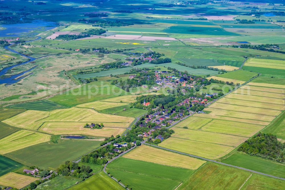 Aventoft from the bird's eye view: Agricultural land and field boundaries surround the settlement area of the village in Aventoft in the state Schleswig-Holstein, Germany