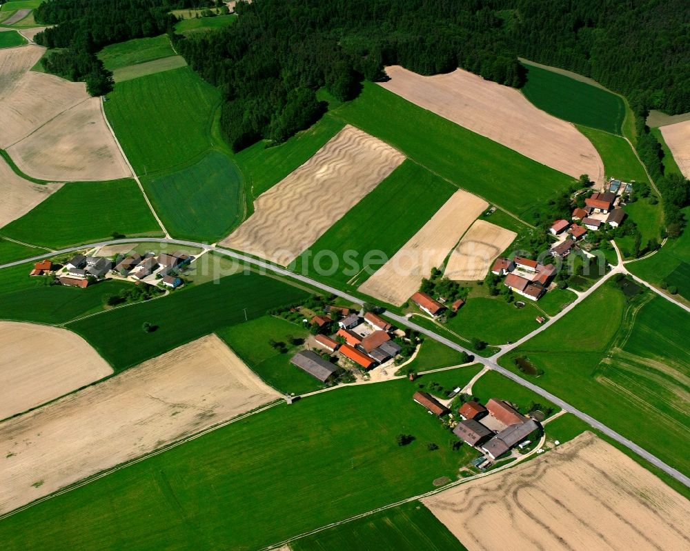 Bad Birnbach from above - Agricultural land and field boundaries surround the settlement area of the village in Bad Birnbach in the state Bavaria, Germany