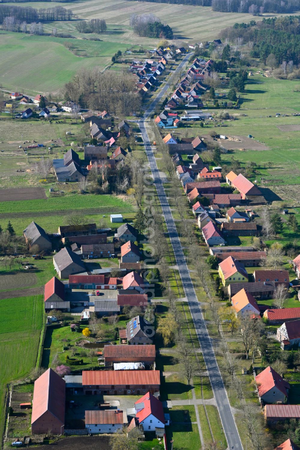 Aerial image Banzendorf - Agricultural land and field boundaries surround the settlement area of the village in Banzendorf in the state Brandenburg, Germany