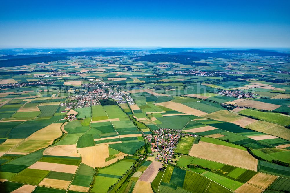 Aerial image Barfelde - Agricultural land and field boundaries surround the settlement area of the village on street Schulstrasse in Barfelde in the state Lower Saxony, Germany