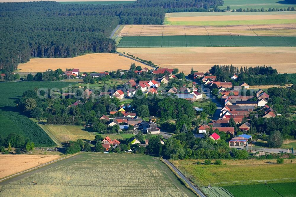 Baruth/Mark from above - Agricultural land and field boundaries surround the settlement area of the village in Baruth/Mark in the state Brandenburg, Germany