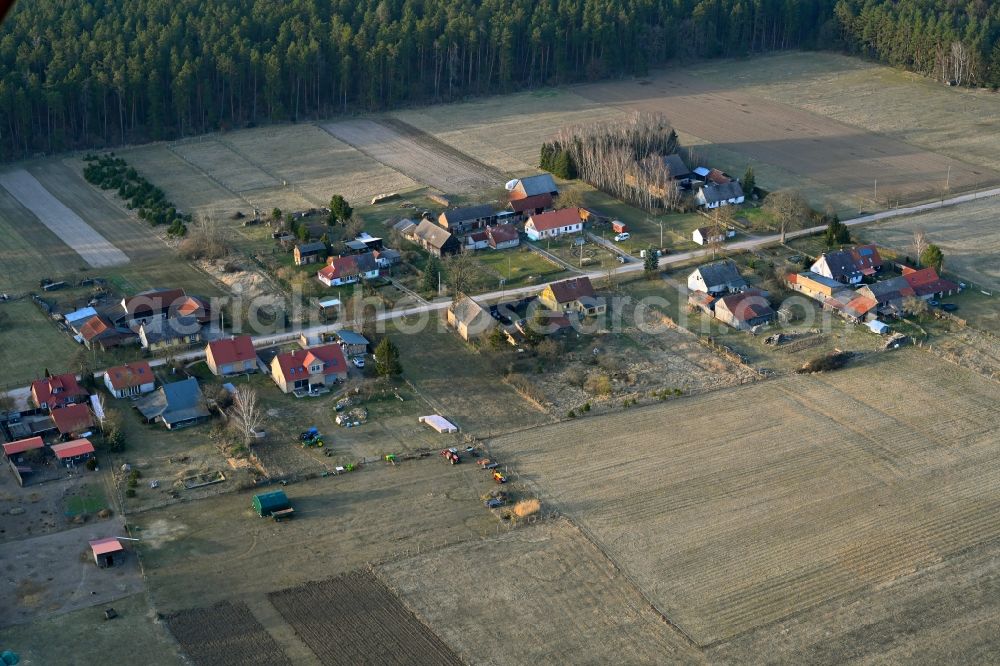 Aerial photograph Basdorf - Agricultural land and field boundaries surround the settlement area of the village in Basdorf in the state Brandenburg, Germany