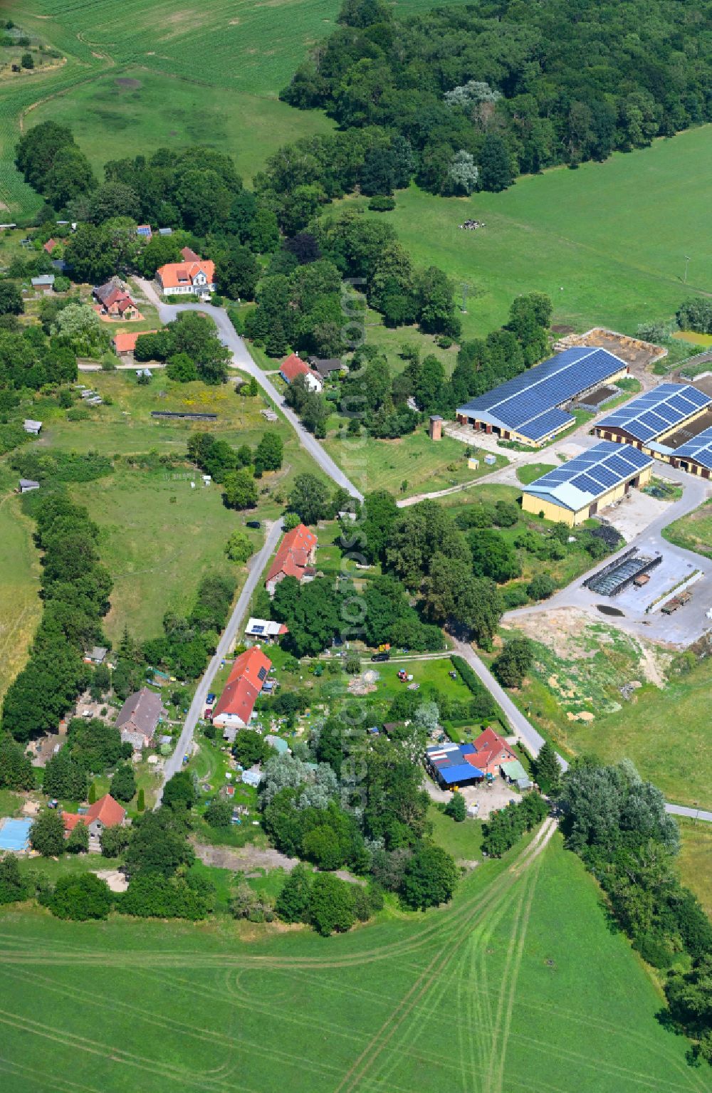 Baumgarten from the bird's eye view: Agricultural land and field boundaries surround the settlement area of the village in Baumgarten in the state Mecklenburg - Western Pomerania, Germany