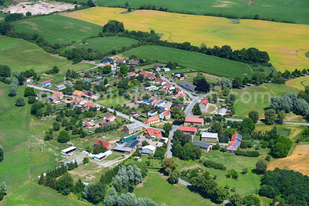 Aerial image Baumgarten - Agricultural land and field boundaries surround the settlement area of the village in Baumgarten in the state Mecklenburg - Western Pomerania, Germany