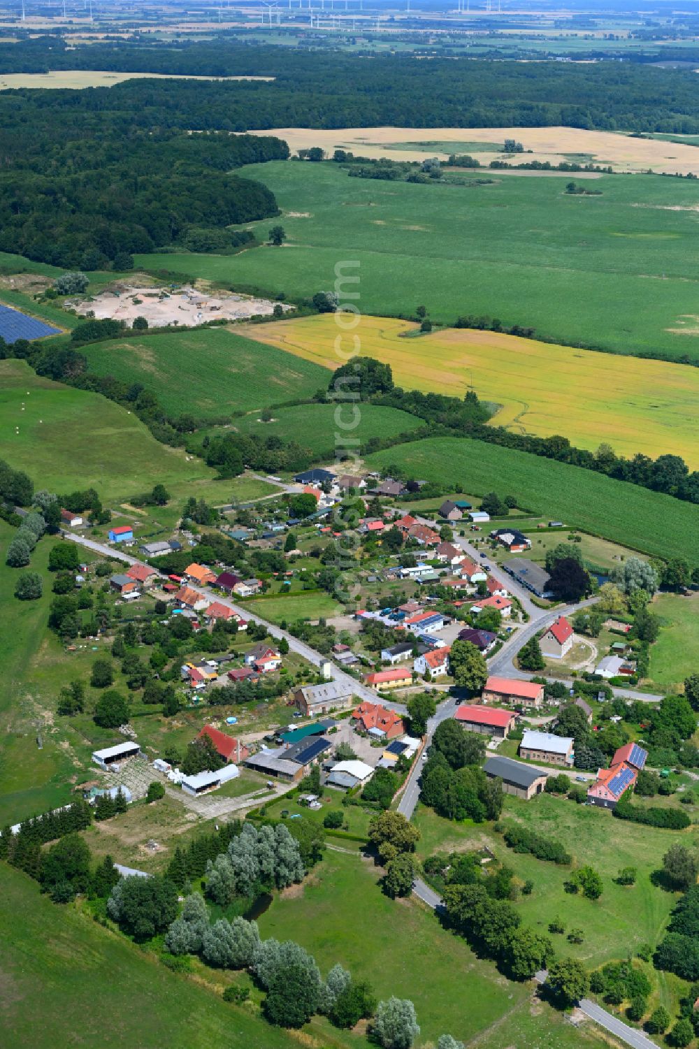 Aerial photograph Baumgarten - Agricultural land and field boundaries surround the settlement area of the village in Baumgarten in the state Mecklenburg - Western Pomerania, Germany