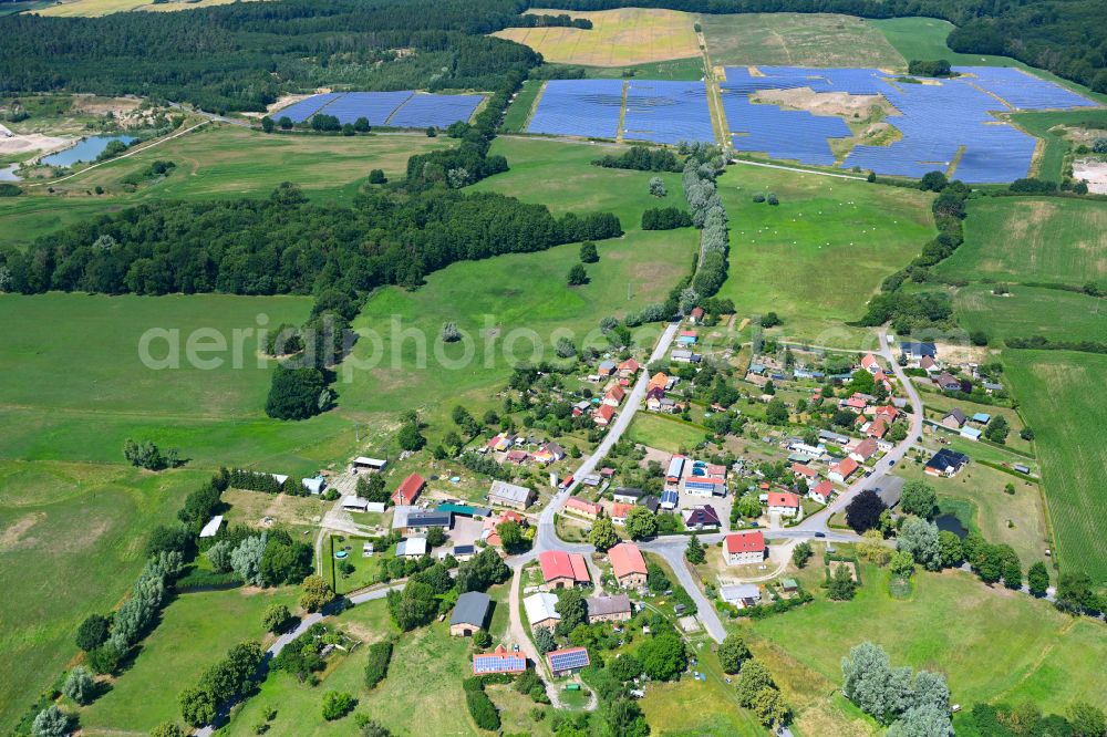 Baumgarten from the bird's eye view: Agricultural land and field boundaries surround the settlement area of the village in Baumgarten in the state Mecklenburg - Western Pomerania, Germany