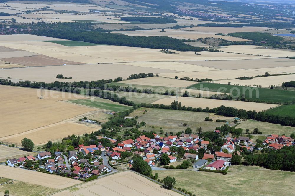 Bechstedtstraß from above - Agricultural land and field boundaries surround the settlement area of the village in Bechstedtstrass in the state Thuringia, Germany