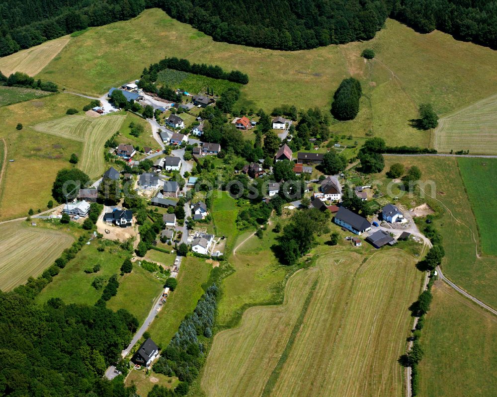 Beckinghausen from above - Agricultural land and field boundaries surround the settlement area of the village in Beckinghausen in the state North Rhine-Westphalia, Germany