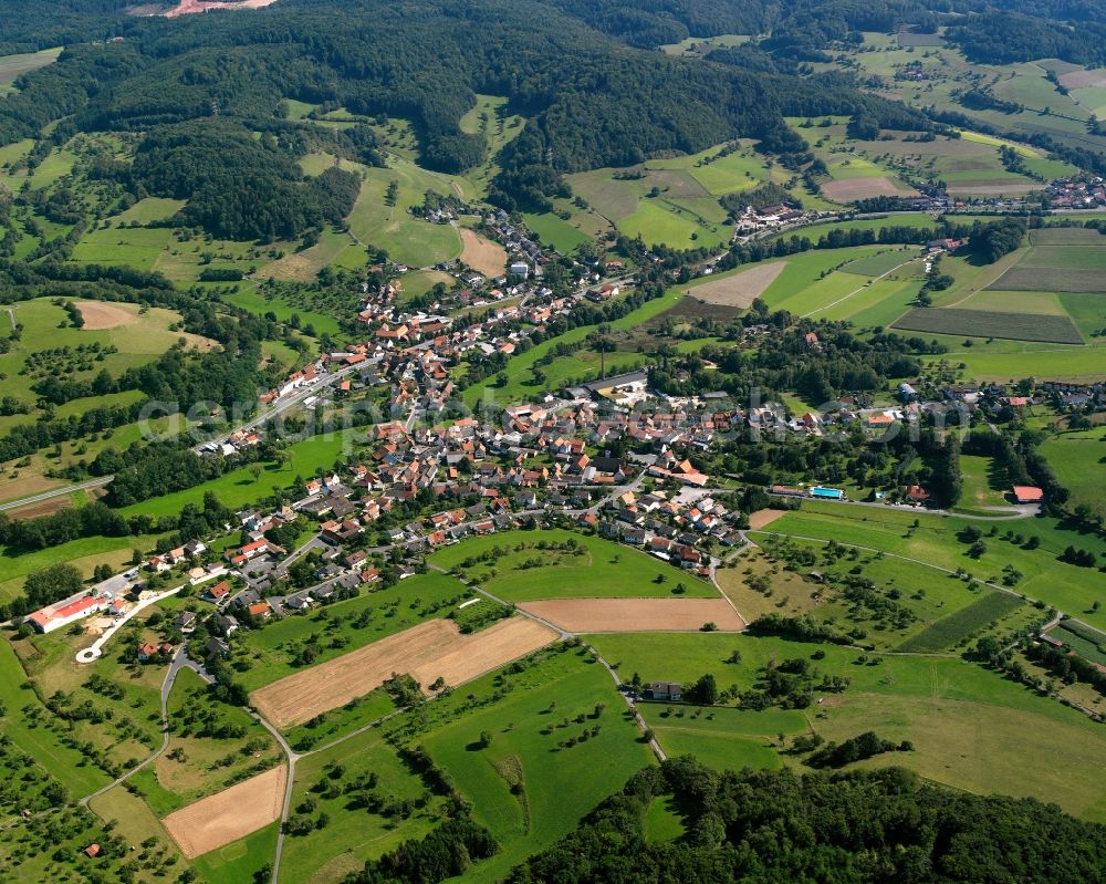 Aerial photograph Beerfurth - Agricultural land and field boundaries surround the settlement area of the village in Beerfurth in the state Hesse, Germany