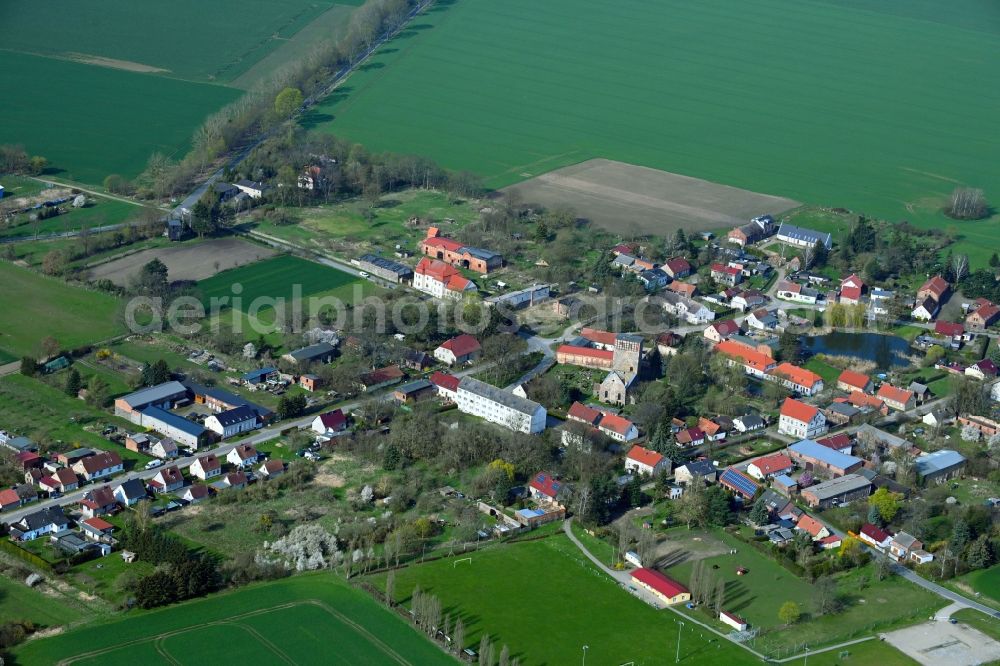 Beiersdorf-Freudenberg from above - Agricultural land and field boundaries surround the settlement area of the village in Beiersdorf-Freudenberg in the state Brandenburg, Germany