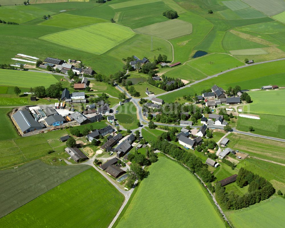 Benk from above - Agricultural land and field boundaries surround the settlement area of the village in Benk in the state Bavaria, Germany