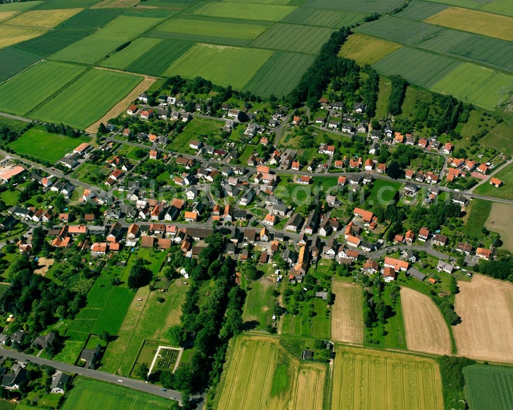 Aerial photograph Benterode - Agricultural land and field boundaries surround the settlement area of the village in Benterode in the state Lower Saxony, Germany