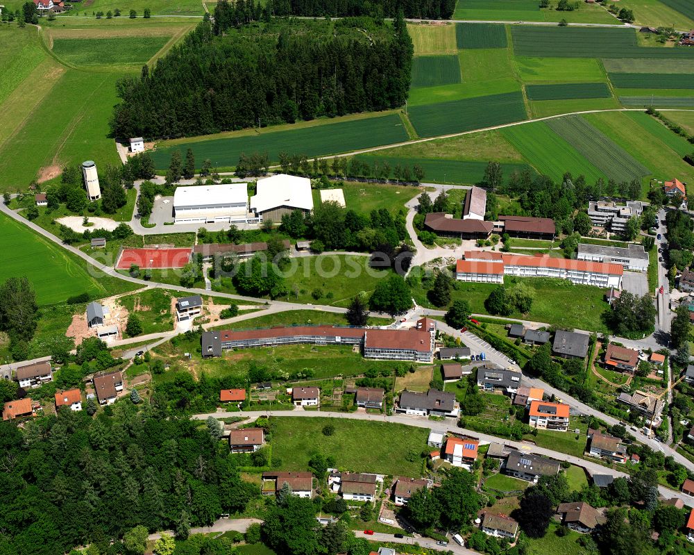 Aerial photograph Überberg - Agricultural land and field boundaries surround the settlement area of the village in Überberg in the state Baden-Wuerttemberg, Germany