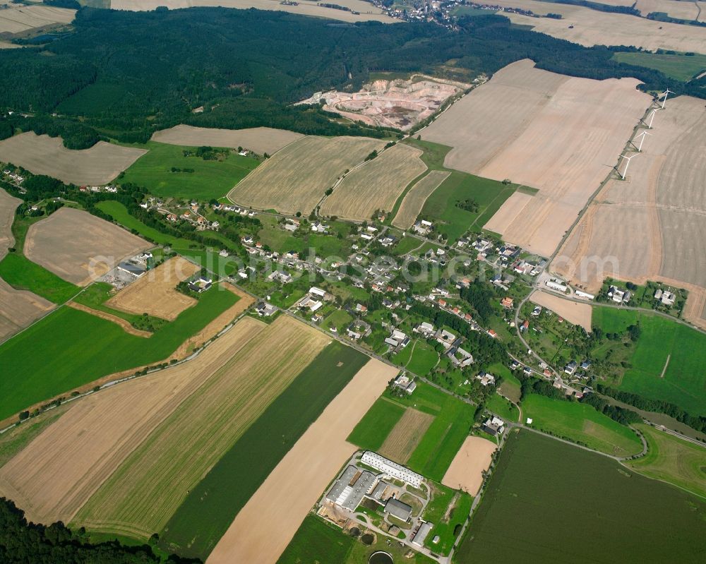 Aerial photograph Berbersdorf - Agricultural land and field boundaries surround the settlement area of the village in Berbersdorf in the state Saxony, Germany