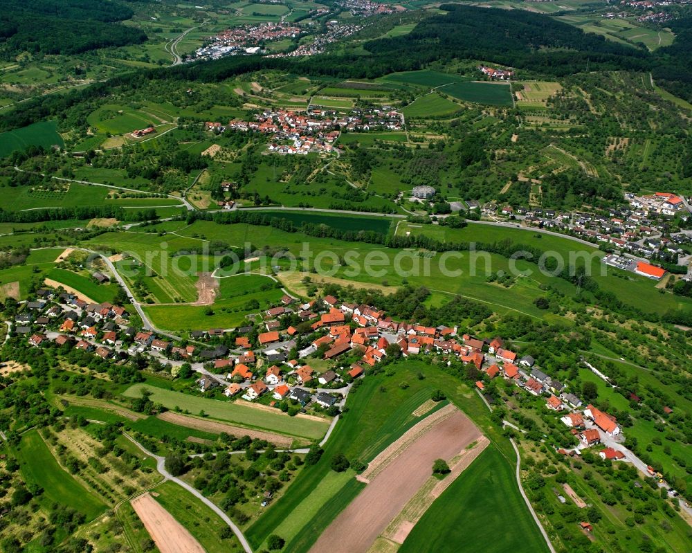 Berglen from above - Agricultural land and field boundaries surround the settlement area of the village in Berglen in the state Baden-Wuerttemberg, Germany