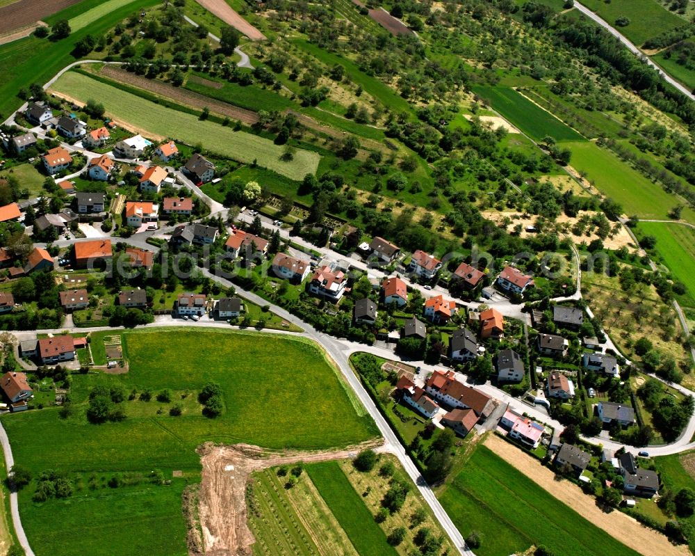 Berglen from above - Agricultural land and field boundaries surround the settlement area of the village in Berglen in the state Baden-Wuerttemberg, Germany