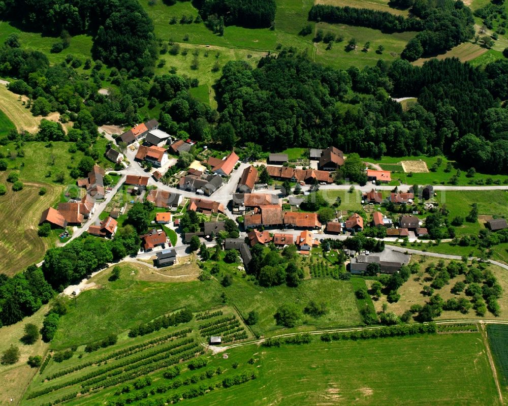 Bergöschingen from the bird's eye view: Agricultural land and field boundaries surround the settlement area of the village in Bergöschingen in the state Baden-Wuerttemberg, Germany