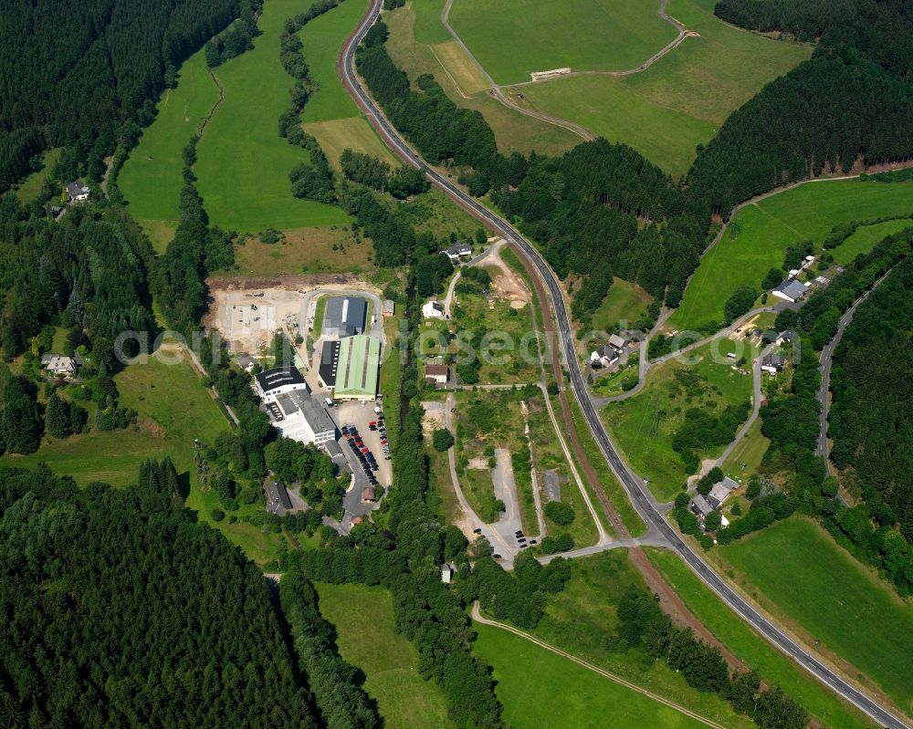 Aerial image Bermershausen - Agricultural land and field boundaries surround the settlement area of the village in Bermershausen at Siegerland in the state North Rhine-Westphalia, Germany