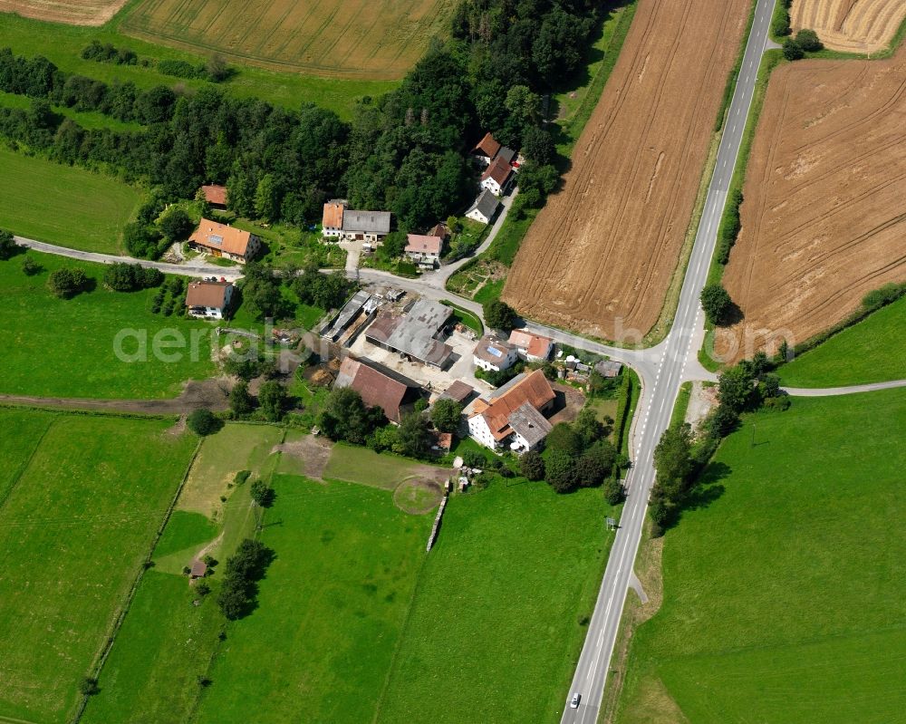 Aerial image Bernweiler - Agricultural land and field boundaries surround the settlement area of the village in Bernweiler in the state Baden-Wuerttemberg, Germany