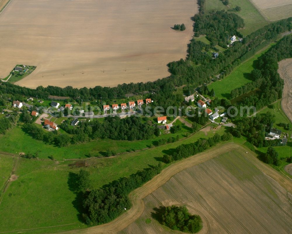 Aerial image Berthelsdorf - Agricultural land and field boundaries surround the settlement area of the village in Berthelsdorf in the state Saxony, Germany