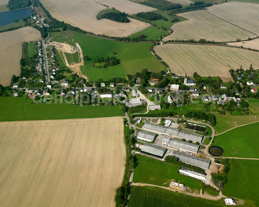 Berthelsdorf from the bird's eye view: Agricultural land and field boundaries surround the settlement area of the village in Berthelsdorf in the state Saxony, Germany