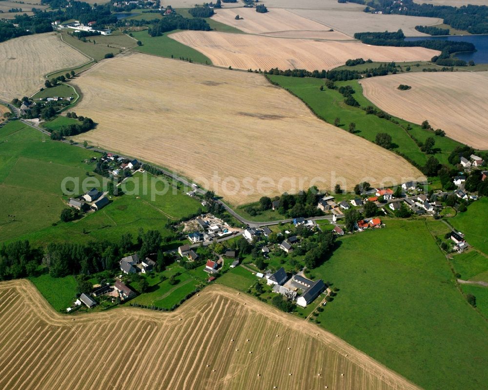 Aerial image Berthelsdorf - Agricultural land and field boundaries surround the settlement area of the village in Berthelsdorf in the state Saxony, Germany