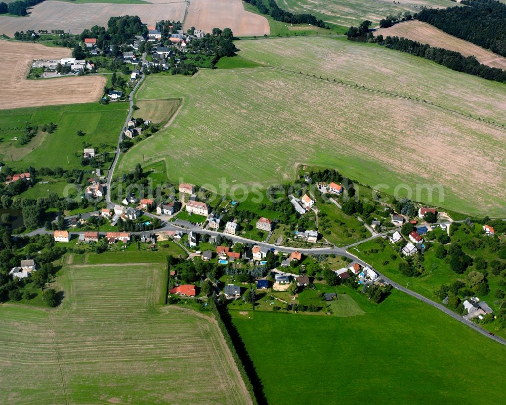 Aerial image Berthelsdorf - Agricultural land and field boundaries surround the settlement area of the village in Berthelsdorf in the state Saxony, Germany