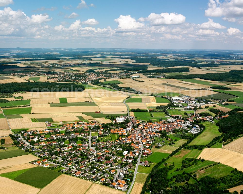 Aerial image Berwangen - Agricultural land and field boundaries surround the settlement area of the village in Berwangen in the state Baden-Wuerttemberg, Germany