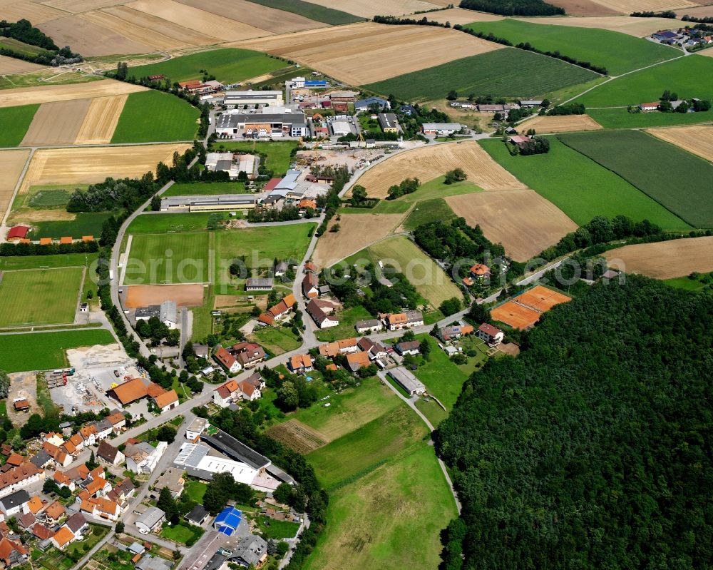 Aerial photograph Berwangen - Agricultural land and field boundaries surround the settlement area of the village in Berwangen in the state Baden-Wuerttemberg, Germany