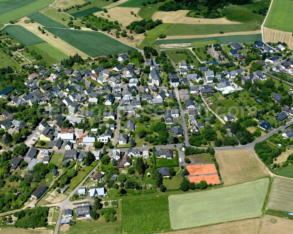 Beulich from the bird's eye view: Agricultural land and field boundaries surround the settlement area of the village in Beulich in the state Rhineland-Palatinate, Germany