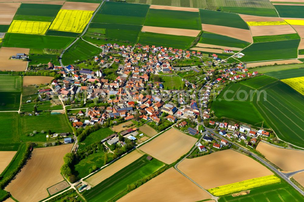 Aerial photograph Bibergau - Agricultural land and field boundaries surround the settlement area of the village in Bibergau in the state Bavaria, Germany