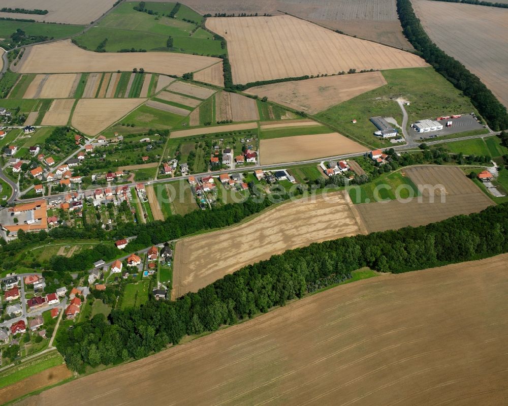 Aerial photograph Bickenriede - Agricultural land and field boundaries surround the settlement area of the village in Bickenriede in the state Thuringia, Germany