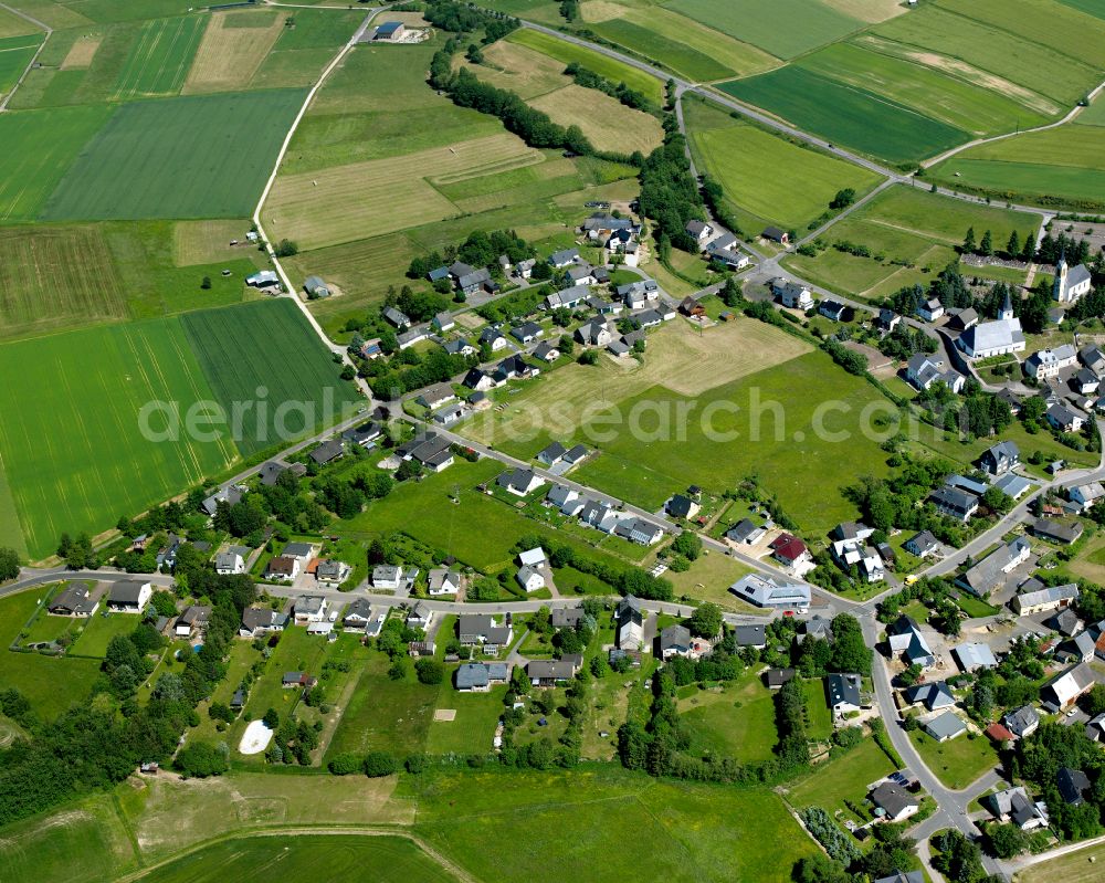 Aerial photograph Biebern - Agricultural land and field boundaries surround the settlement area of the village in Biebern in the state Rhineland-Palatinate, Germany