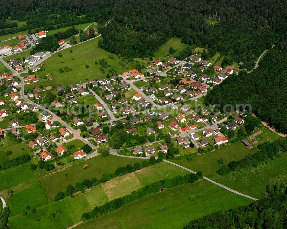 Bieselsberg from above - Agricultural land and field boundaries surround the settlement area of the village in Bieselsberg in the state Baden-Wuerttemberg, Germany