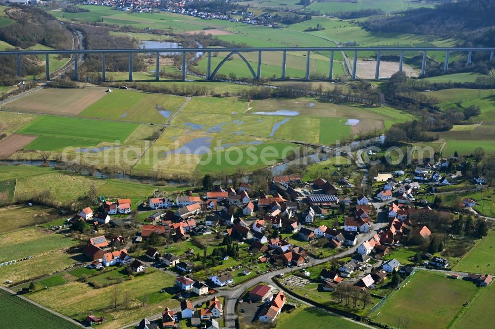 Aerial image Binsförth - Agricultural land and field boundaries surround the settlement area of the village in Binsförth in the state Hesse, Germany