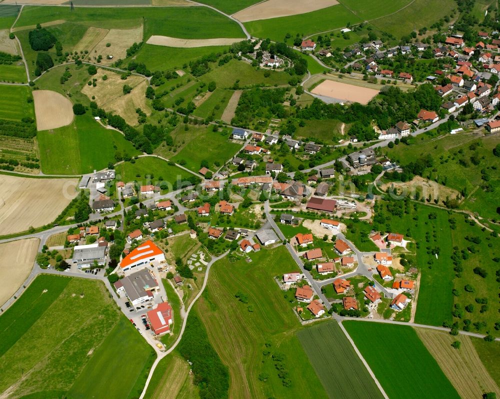 Birndorf from above - Agricultural land and field boundaries surround the settlement area of the village in Birndorf in the state Baden-Wuerttemberg, Germany