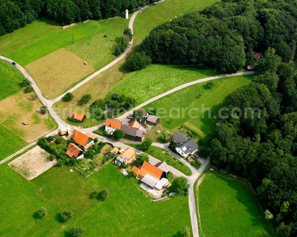 Aerial image Blindenmannshäusle - Agricultural land and field boundaries surround the settlement area of the village in Blindenmannshäusle in the state Baden-Wuerttemberg, Germany