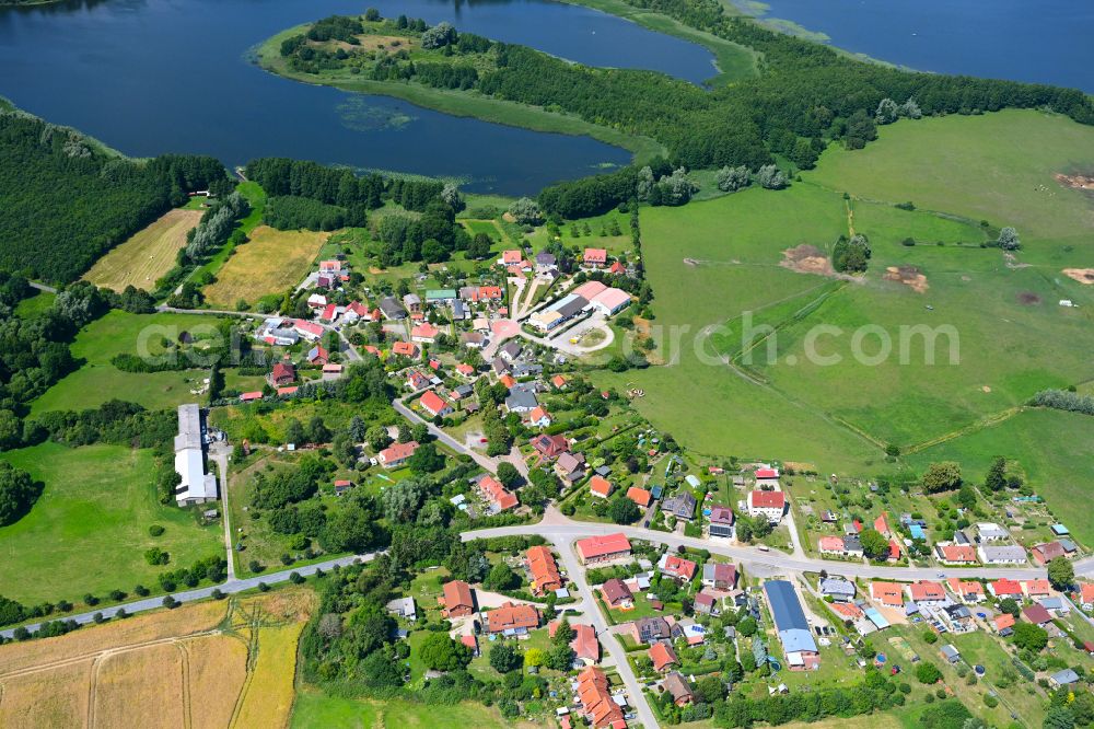 Bölkow from the bird's eye view: Agricultural land and field boundaries surround the settlement area of the village in Bölkow in the state Mecklenburg - Western Pomerania, Germany