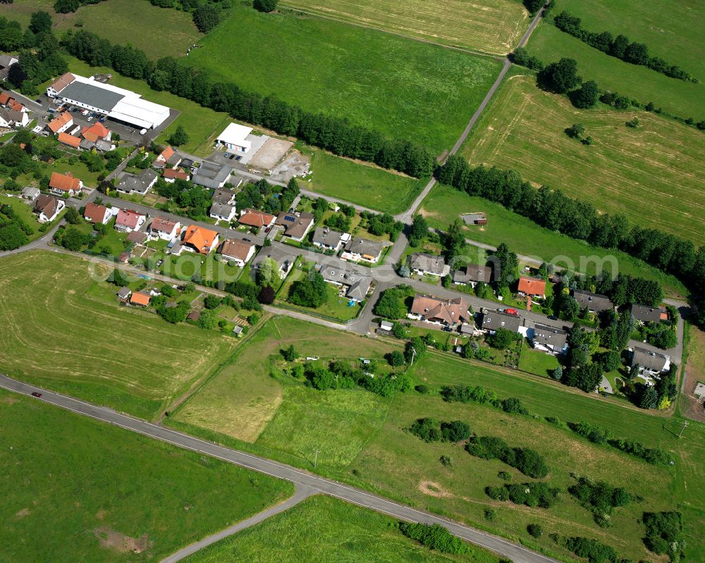 Aerial image Bobenhausen - Agricultural land and field boundaries surround the settlement area of the village in Bobenhausen in the state Hesse, Germany