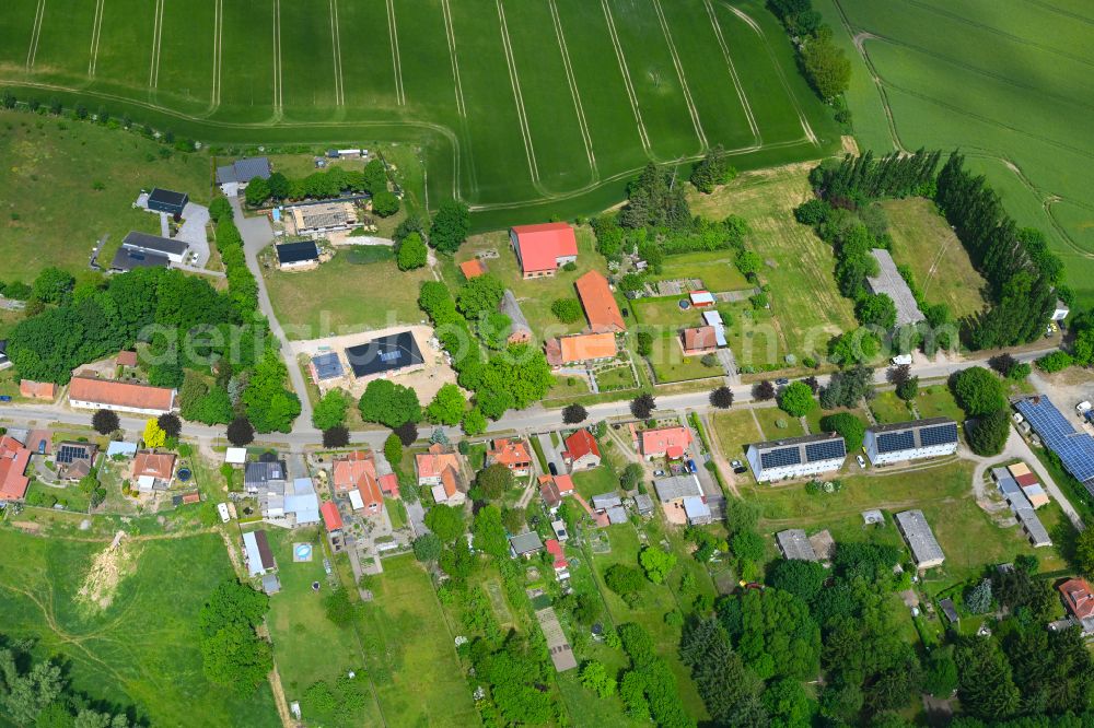 Aerial image Bobzin - Agricultural land and field boundaries surround the settlement area of the village in Bobzin in the state Mecklenburg - Western Pomerania, Germany