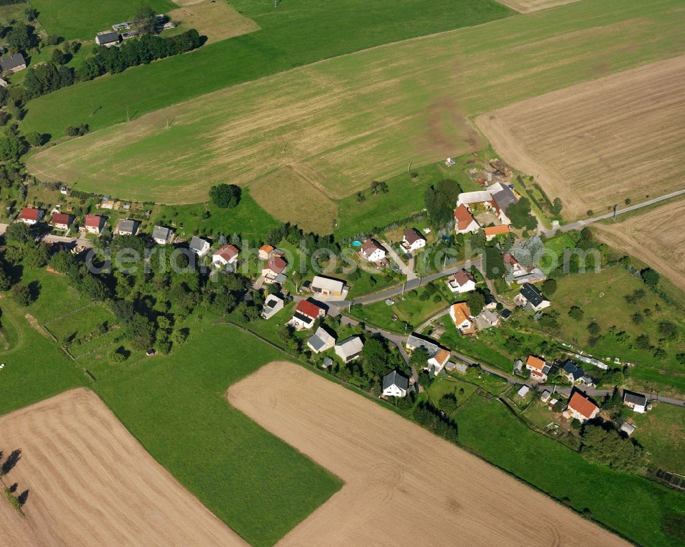 Bockendorf from the bird's eye view: Agricultural land and field boundaries surround the settlement area of the village in Bockendorf in the state Saxony, Germany