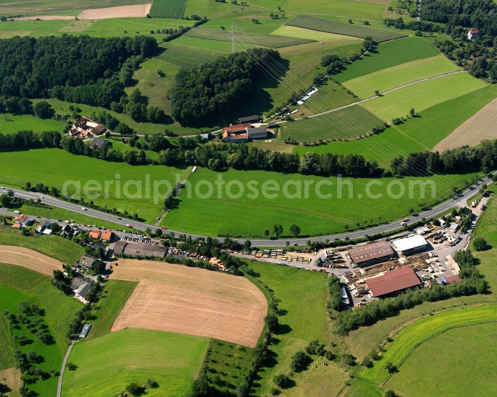 Aerial image Bockenrod - Agricultural land and field boundaries surround the settlement area of the village in Bockenrod in the state Hesse, Germany